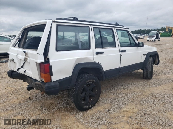 1994 Jeep Cherokee Sport with VIN 1J4FT68S8RL170171, listed as a Copart auction lot 70642694 with 240,165 mi miles and Salvage Title. Bid and sale history available at carsss.com. Image 3.