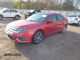 2011 Ford Fusion SE with VIN 3FAHP0HGXBR199597, listed as a IAAI auction lot 41950604 with 184,668 mi miles. Bid and sale history available at carsss.com. Image 2.