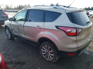 2017 Ford Escape Titanium with VIN 1FMCU0JD0HUB79739, listed as a IAAI auction lot 41807975 with 121,902 mi miles. Bid and sale history available at carsss.com. Image 3.
