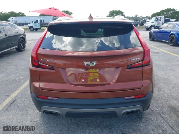 2019 Cadillac XT4 FWD Premium Luxury with VIN 1GYFZCR41KF183507, listed as a IAAI auction lot 41987176 with 64,803 mi miles. Bid and sale history available at carsss.com. Image 16.