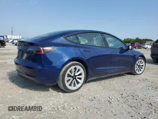 2023 Tesla Model 3 z VIN 5YJ3E1EA3PF434205, wystawiony jako Copart lot #57917305 z przebiegiem 82 481 mil mil oraz Szkody całkowita. Historia ofert i sprzedaży dostępna na DreamBid. Obrazek 3.