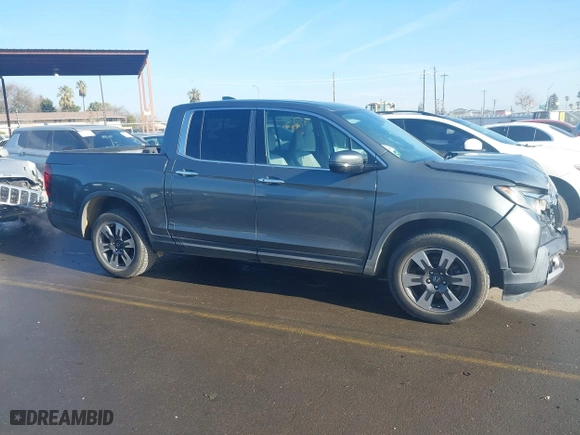 2017 Honda Ridgeline RTL-E with VIN 5FPYK3F77HB012606, listed as a IAAI auction lot 41409677 with 93,943 mi miles. Bid and sale history available at carsss.com. Image 13.