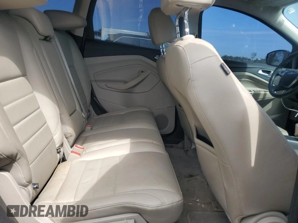 2013 Ford Escape SEL z VIN 1FMCU9HX6DUB05689, wystawiony jako Copart lot #55148765 z przebiegiem 69 178 mil mil oraz Czysty tytuł • Clean title. Historia ofert i sprzedaży dostępna na DreamBid. Obrazek 11.