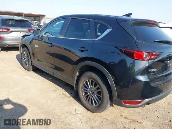 2019 Mazda CX-5 Touring with VIN JM3KFACM6K0533203, listed as a IAAI auction lot 41973125 with 106,882 mi miles and . Bid and sale history available at carsss.com. Image 3.