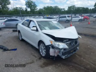 2014 Toyota Camry L with VIN 4T1BF1FK7EU403930, listed as a IAAI auction lot 41010715 with 0 mi miles. Bid and sale history available at carsss.com. Image 1.