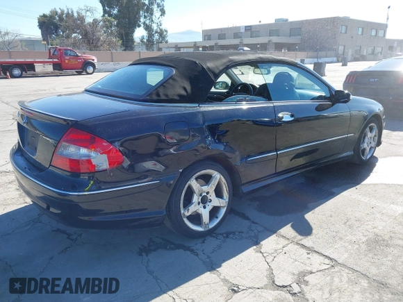 2009 Mercedes-Benz CLK-Class 3.5L with VIN WDBTK56GX9T107902, listed as a IAAI auction lot 41867771 with 134,939 mi miles. Bid and sale history available at carsss.com. Image 4.