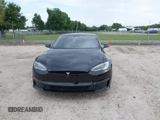2022 Tesla Model S with VIN 5YJSA1E51NF472152, listed as a IAAI auction lot 42625943 with 60,290 mi miles and . Bid and sale history available at DreamBid. Image 11.