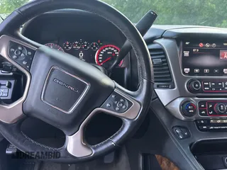 2015 GMC Yukon XL Denali with VIN 1GKS1JKJ0FR246265, listed as a Copart auction lot 54958185 with 157,545 mi miles and Clean Title. Bid and sale history available at carsss.com. Image 9.