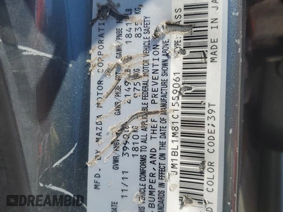 2012 Mazda 3 i Grand Touring with VIN JM1BL1M81C1559061, listed as a Copart auction lot 55989095 with Not Provided miles and Salvage Title. Bid and sale history available at DreamBid. Image 14.