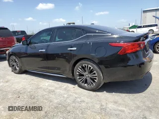2016 Nissan Maxima SL with VIN 1N4AA6AP1GC409820, listed as a Copart auction lot 65558494 with 121,059 mi miles and Salvage title. Bid and sale history available at DreamBid. Image 2.