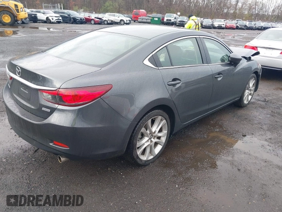 2014 Mazda Mazda6 i Touring with VIN JM1GJ1V6XE1138483, listed as a IAAI auction lot 41956426 with 91,294 mi miles. Bid and sale history available at carsss.com. Image 4.