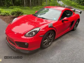 2014 Porsche Cayman S с VIN WP0AB2A80EK19134X, выставлен на аукционе Copart как лот 63546245 с пробегом 68 707 миль миль и Чистый • Clean title. История ставок и продаж доступна на DreamBid. Изображение 2.