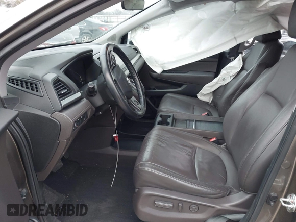 2018 Honda Odyssey EX-L with VIN 5FNRL6H75JB044789, listed as a IAAI auction lot 41625002 with 58,033 mi miles and . Bid and sale history available at DreamBid. Image 5.