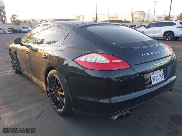 2012 Porsche Panamera Turbo with VIN WP0AC2A79CL090481, listed as a IAAI auction lot 41954044 with 59,433 mi miles. Bid and sale history available at carsss.com. Image 3.