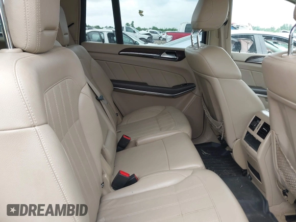 2014 Mercedes-Benz GL 450 with VIN 4JGDF7CE0EA372225, listed as a IAAI auction lot 42141012 with 158,045 mi miles and . Bid and sale history available at DreamBid. Image 8.