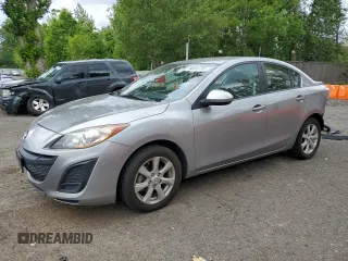 2011 Mazda 3 i Touring with VIN JM1BL1VG2B1498971, listed as a Copart auction lot 56588785 with 147,085 mi miles and Salvage title. Bid and sale history available at DreamBid. Image 1.