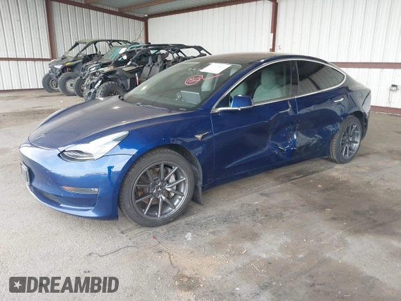 2019 Tesla Model 3 Mid Range z VIN 5YJ3E1EA3KF314882, wystawiony jako IAAI lot #42009874 z przebiegiem 160 381 mil mil oraz . Historia ofert i sprzedaży dostępna na DreamBid. Obrazek 2.