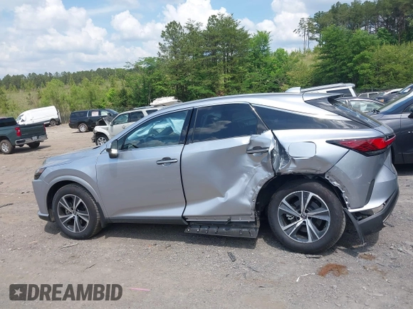 2024 Lexus RX 350 with VIN JTJCHMAAXR2020243, listed as a IAAI auction lot 42163373 with 6,970 mi miles and . Bid and sale history available at DreamBid. Image 14.