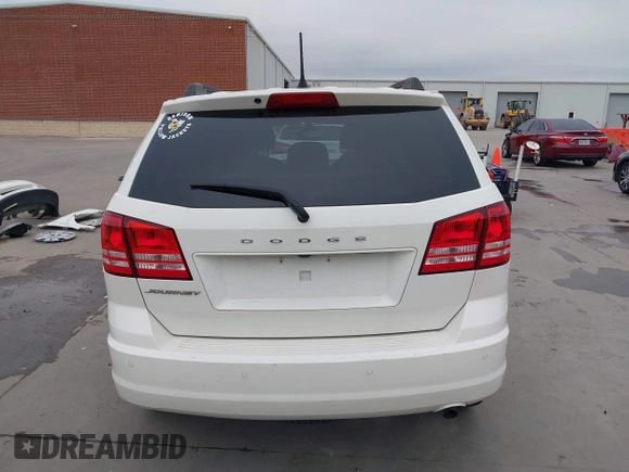 2020 Dodge Journey SE Value with VIN 3C4PDCAB4LT254595, listed as a IAAI auction lot 41572159 with 124,804 mi miles and . Bid and sale history available at carsss.com. Image 17.