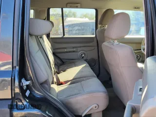2010 Jeep Commander Sport with VIN 1J4RH4GK9AC147040, listed as a IAAI auction lot 41975670 with 89,213 mi miles. Bid and sale history available at carsss.com. Image 7.