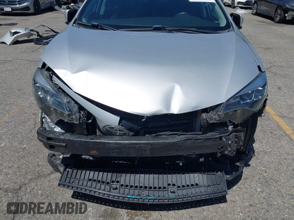 2019 Toyota Corolla L with VIN 2T1BURHE7KC139228, listed as a IAAI auction lot 42243979 with 106,008 mi miles and . Bid and sale history available at DreamBid. Image 6.