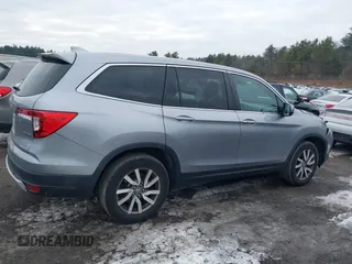 2021 Honda Pilot EX-L with VIN 5FNYF6H57MB010259, listed as a IAAI auction lot 41307012 with 57,849 mi miles. Bid and sale history available at carsss.com. Image 13.