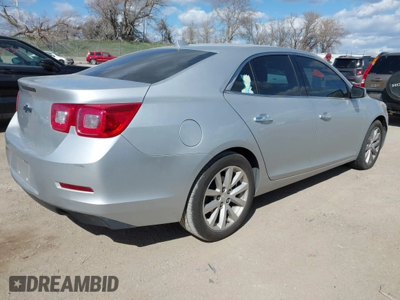 2013 Chevrolet Malibu LTZ with VIN 1G11H5SA3DF192011, listed as a IAAI auction lot 42022440 with 124,603 mi miles and . Bid and sale history available at DreamBid. Image 4.
