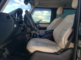 2015 Mercedes-Benz G-Class G 550 with VIN WDCYC3HF6FX241088, listed as a Copart auction lot 46104385 with 97,954 mi miles and Clean Title. Bid and sale history available at carsss.com. Image 7.