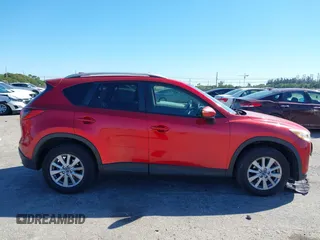 2015 Mazda CX-5 Touring with VIN JM3KE2CY5F0542184, listed as a IAAI auction lot 41770264 with 119,592 mi miles. Bid and sale history available at carsss.com. Image 13.