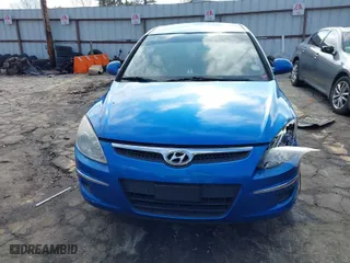 2012 Hyundai Elantra Touring GLS with VIN KMHDB8AE5CU134449, listed as a IAAI auction lot 41535397 with 214,247 mi miles. Bid and sale history available at carsss.com. Image 12.