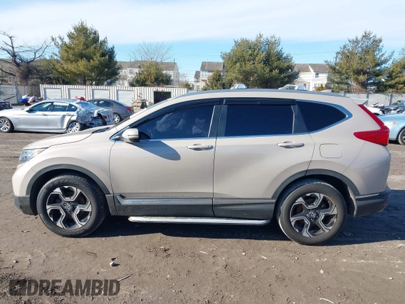 2017 Honda CR-V Touring with VIN 5J6RW2H94HL013536, listed as a IAAI auction lot 41577317 with 97,132 mi miles. Bid and sale history available at carsss.com. Image 14.