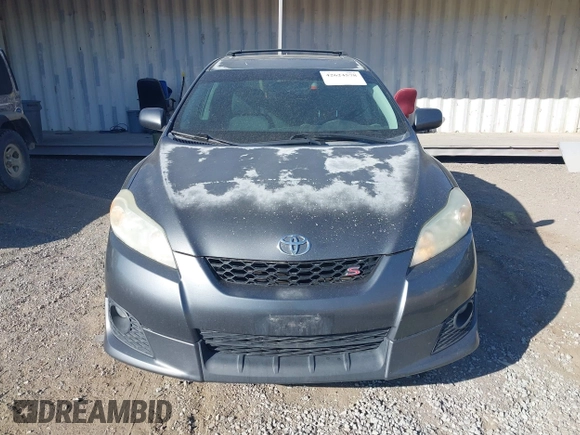2009 Toyota Matrix S z VIN 2T1LE40E09C006482, wystawiony jako IAAI lot #42624578 z przebiegiem 163 224 mil mil oraz . Historia ofert i sprzedaży dostępna na DreamBid. Obrazek 12.