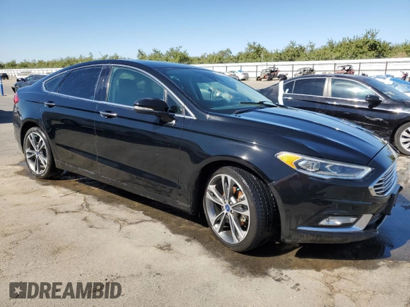 2018 Ford Fusion Titanium with VIN 3FA6P0K91JR146027, listed as a Copart auction lot 83468784 with 67,046 mi miles and Salvage title. Bid and sale history available at DreamBid. Image 4.