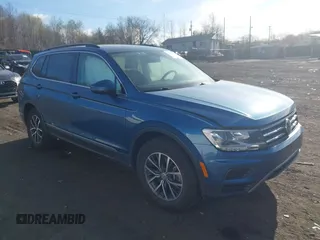 2020 Volkswagen Tiguan SE with VIN 3VV2B7AX2LM017277, listed as a IAAI auction lot 42075052 with 72,248 mi miles and . Bid and sale history available at DreamBid. Image 1.