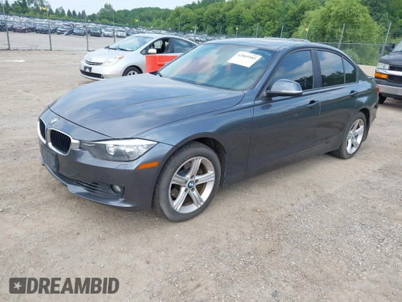 2014 BMW 3 Series 328i xDrive with VIN WBA3B3C55EJ977584, listed as a IAAI auction lot 42805585 with 135,855 mi miles and . Bid and sale history available at DreamBid. Image 2.