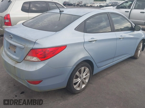 2013 Hyundai Accent GLS with VIN KMHCU4AE8DU583303, listed as a IAAI auction lot 42504235 with 113,992 mi miles and . Bid and sale history available at DreamBid. Image 4.