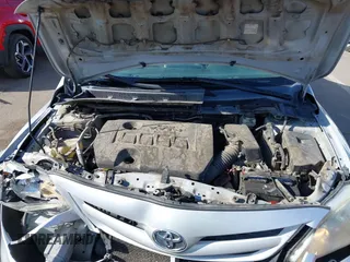 2011 Toyota Corolla L with VIN 2T1BU4EE7BC566402, listed as a IAAI auction lot 41970006 with 244,127 mi miles. Bid and sale history available at carsss.com. Image 10.