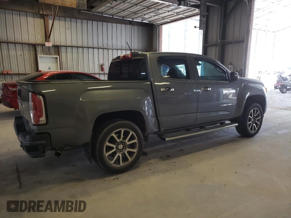 2022 GMC Canyon 4WD Denali with VIN 1GTG6EENXN1223923, listed as a Copart auction lot 68927644 with 30,495 mi miles and Salvage Title. Bid and sale history available at carsss.com. Image 3.