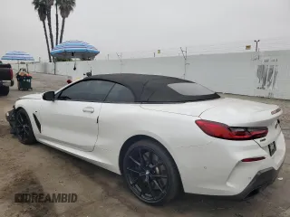 2019 BMW 8 Series M850i xDrive with VIN WBAFY4C57KBX38867, listed as a Copart auction lot 76091124 with 25,850 mi miles and Salvage Title. Bid and sale history available at carsss.com. Image 2.