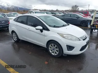 2012 Ford Fiesta SE with VIN 3FADP4BJ8CM102695, listed as a IAAI auction lot 41734833 with 131,779 mi miles. Bid and sale history available at carsss.com. Image 1.