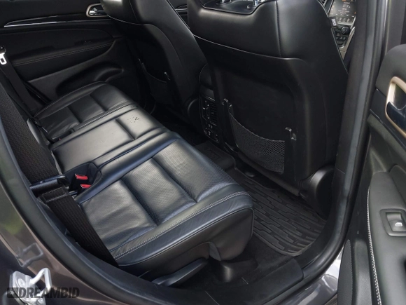 2014 Jeep Grand Cherokee Overland with VIN 1C4RJFCG5EC329377, listed as a IAAI auction lot 40822324 with 106,222 mi miles. Bid and sale history available at carsss.com. Image 8.