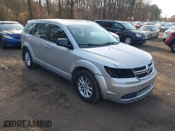 2014 Dodge Journey SE with VIN 3C4PDCAB1ET247218, listed as a IAAI auction lot 41760408 with 148,591 mi miles and . Bid and sale history available at carsss.com. Image 1.