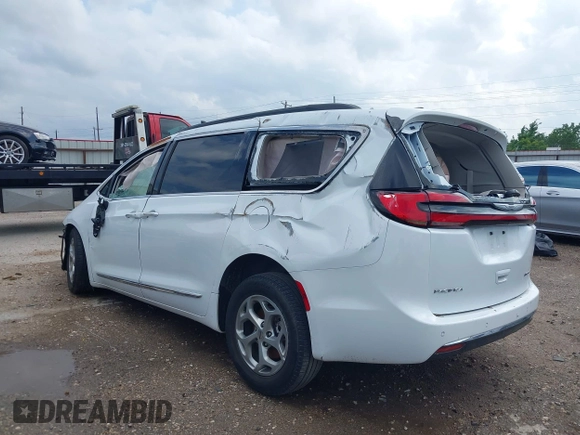 2023 Chrysler Pacifica Limited with VIN 2C4RC1GG4PR619997, listed as a IAAI auction lot 42421682 with 51,520 mi miles and . Bid and sale history available at DreamBid. Image 3.