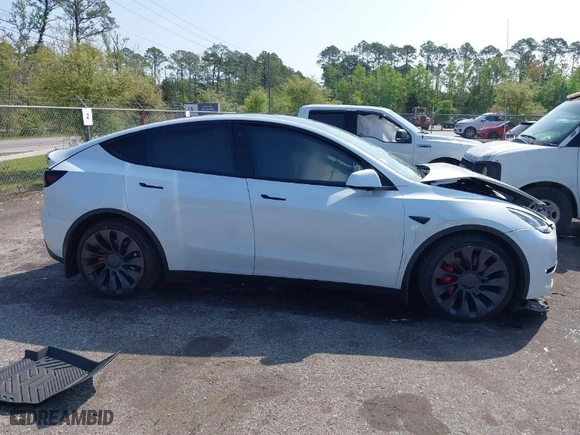 2022 Tesla Model Y Performance with VIN 7SAYGDEF2NF379209, listed as a IAAI auction lot 41917918 with 34,166 mi miles. Bid and sale history available at carsss.com. Image 13.