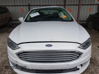 2017 Ford Fusion Hybrid Titanium with VIN 3FA6P0RU1HR322997, listed as a IAAI auction lot 41506630 with 263,589 mi miles and . Bid and sale history available at DreamBid. Image 12.