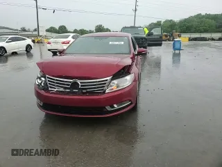 2015 Volkswagen CC Sport z VIN WVWBN7AN1FE826638, wystawiony jako Copart lot #55677795 z przebiegiem 97 317 mil mil oraz Czysty tytuł • Clean title. Historia ofert i sprzedaży dostępna na DreamBid. Obrazek 13.