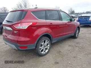 2016 Ford Escape Titanium with VIN 1FMCU9J92GUB13000, listed as a IAAI auction lot 41725258 with 66,817 mi miles. Bid and sale history available at carsss.com. Image 4.