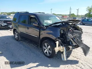 2013 Honda Pilot Touring with VIN 5FNYF4H92DB061840, listed as a IAAI auction lot 41839831 with 136,000 mi miles. Bid and sale history available at carsss.com. Image 1.
