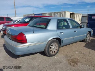 2005 Mercury Grand Marquis LS Premium with VIN 2MEFM75W75X664470, listed as a IAAI auction lot 41960637 with 191,600 mi miles. Bid and sale history available at carsss.com. Image 4.