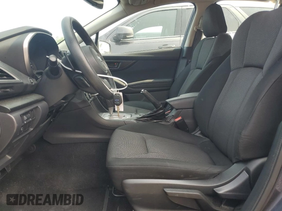 2017 Subaru Impreza Premium with VIN 4S3GTAD61H3711128, listed as a Copart auction lot 58942425 with 127,890 mi miles and Salvage title. Bid and sale history available at DreamBid. Image 7.